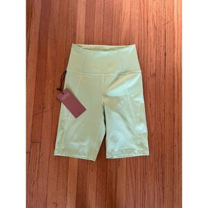 NWT Girlfriend Collective High Rise Bike Shorts in Butterfly Neon Green